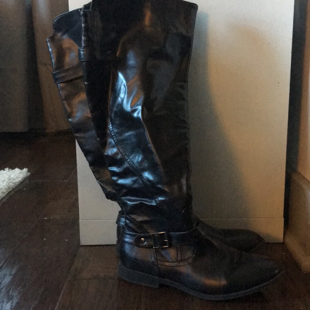 Tall black leather boots